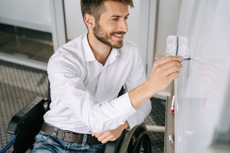 Perfect Accessibility Compliance: Crafting an Inclusive Website 7 Man in White Dress Shirt sitting on a Wheelchair