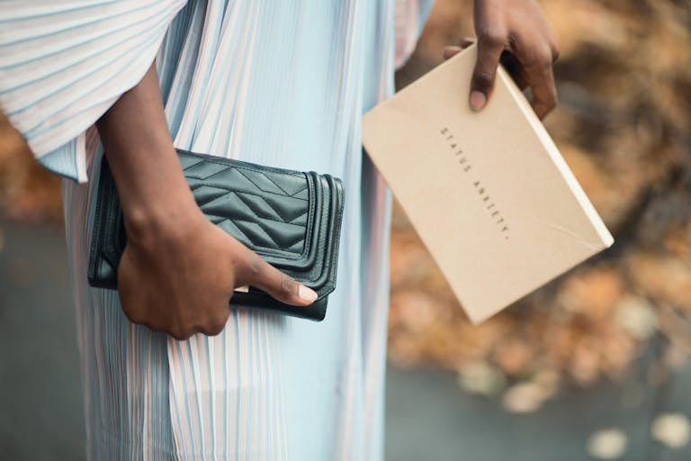 E-Commerce: Trends, Challenges, and Strategies for Success 6 Person Holding Black Leather Wallet